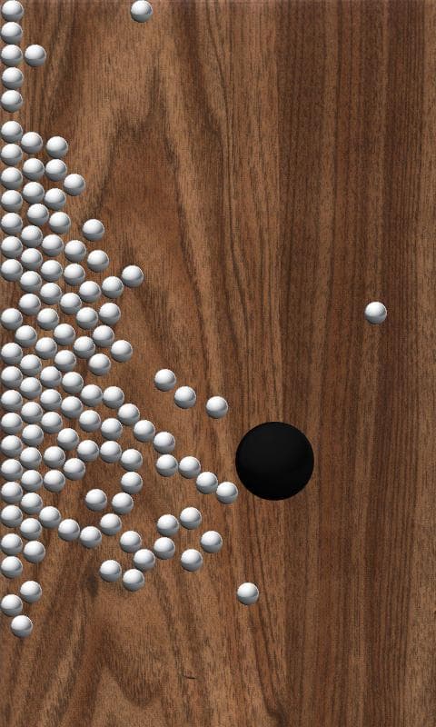 Roll Balls into a hole screenshot 2