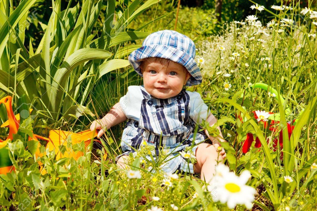 babys walk in a garden